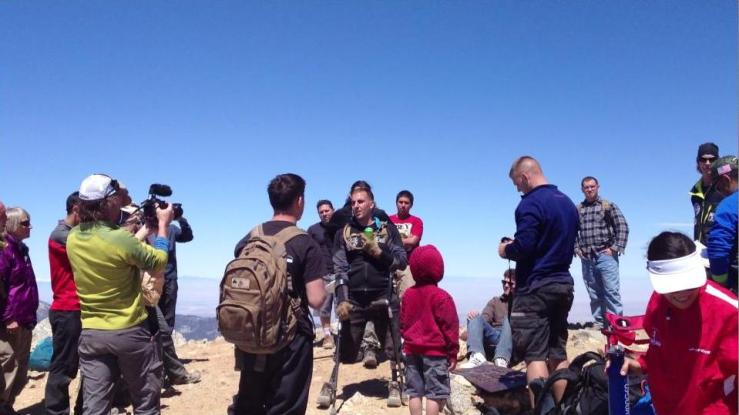 SSgt. Mark Zambon celebrates on the summit.